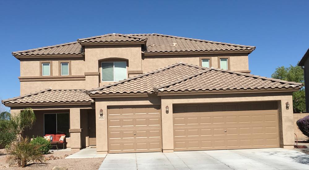 Completed exterior repaint, two-story home